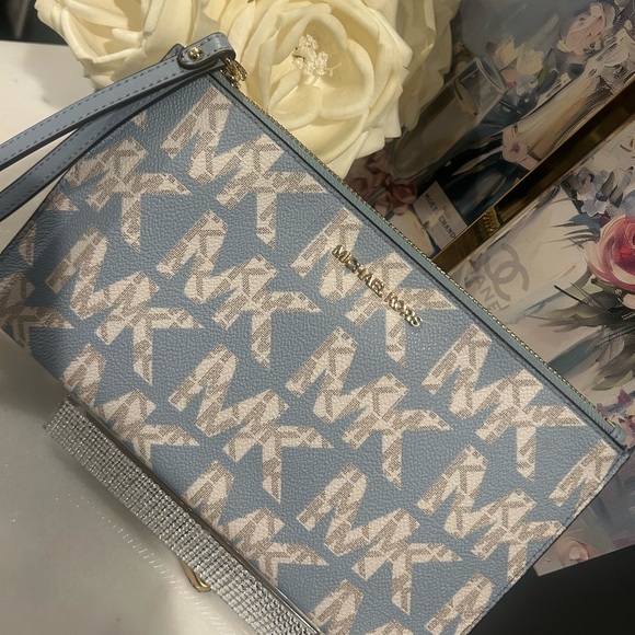 Michael Kors Handbags - Michael Kors Light Blue Logo Zip Wristlet NWOT